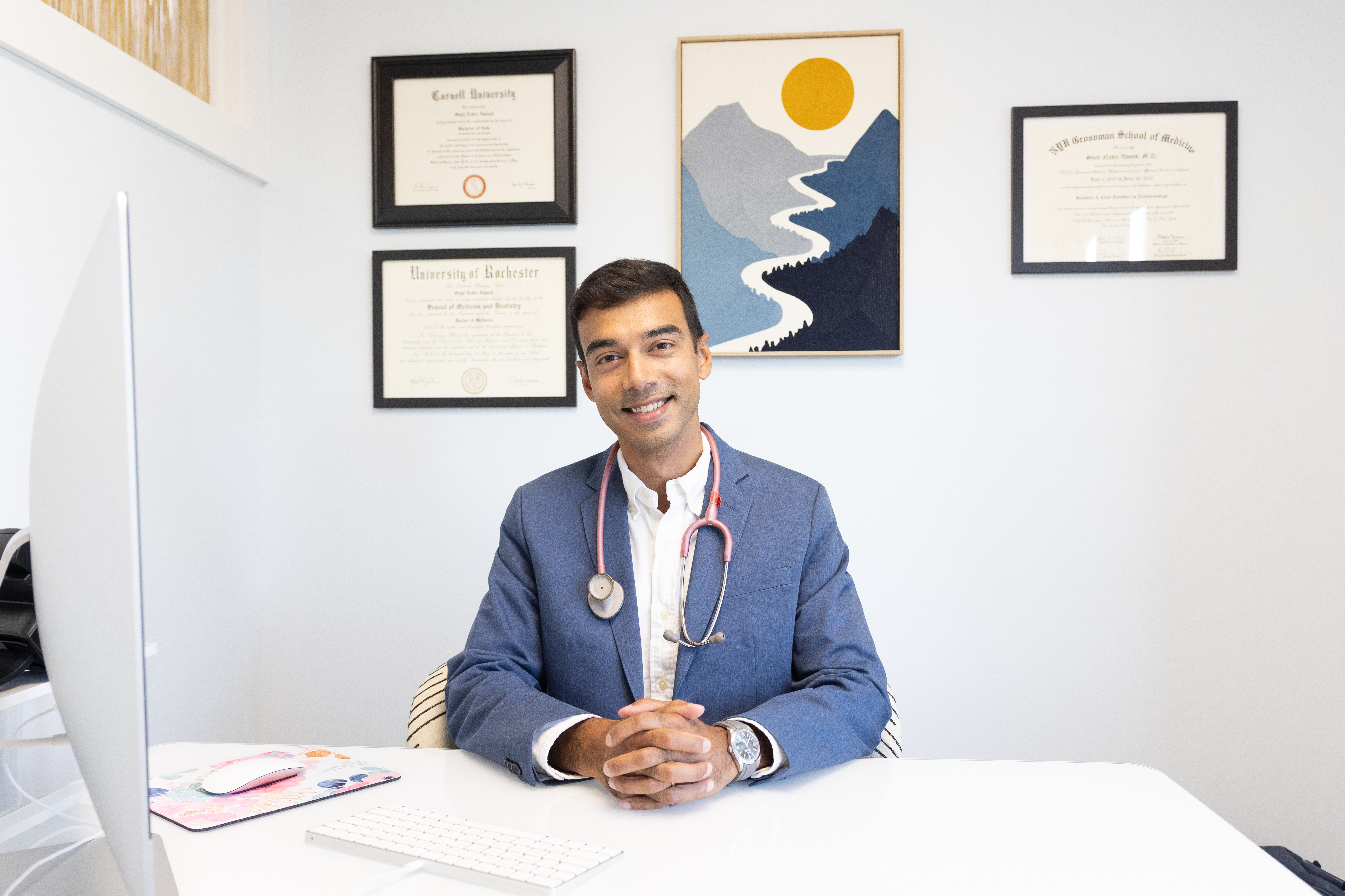 Dr. Shah Ahmed at his desk